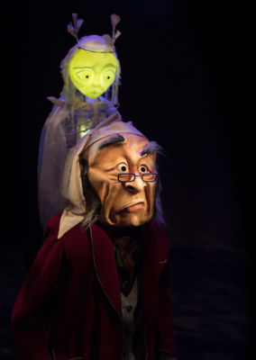 A childhood memory is revealed to Ebenezer Scrooge by the Ghost of Christmas Past in ‘A WONDERHEADS Christmas Carol,’ a whimsical reimagining of the holiday classic touring BC theatres this December. Kate Braidwood as Scrooge, Jessica Hickman The Ghost of Christmas Past (puppeteer). Photo by Daryl Turner (Dimensions: 2769 x 3900px • File Type: JPG • File Size: 3MB) The Ghost of Christmas Past and Ebenezer Scrooge. From 'A WONDERHEADS Christmas Carol' by WONDERHEADS, a physical theatre company specializing in full-face mask performance.